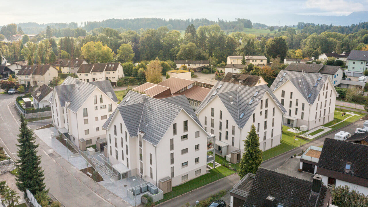 4 Mehrfamilienhäuser in Grüningen Slide 1